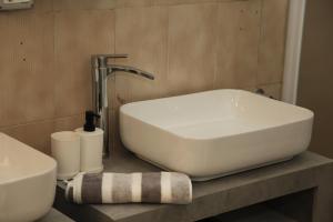 Koupelna v ubytování Nuovo trilocale in Centro Storico ad Abbiategrasso + 11 fotografií