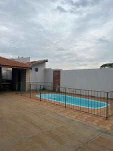 Bazén v ubytování Casa de temporada nebo v jeho okolí