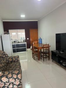 Kuchyň nebo kuchyňský kout v ubytování Casa de temporada