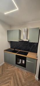 a kitchen with a sink and a counter top at Re Carlo - Appartamento Filomena in Perugia