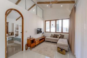 TV a/nebo společenská místnost v ubytování Rock & Lune Boutique Villas