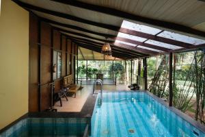 Πισίνα στο ή κοντά στο Discovery Village Kabini