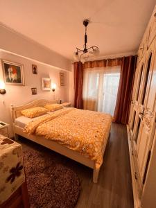 Ένα ή περισσότερα κρεβάτια σε δωμάτιο στο Cip-Apartament24