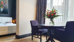 Postel nebo postele na pokoji v ubytování Residenz Stadslogement + 17 fotografií