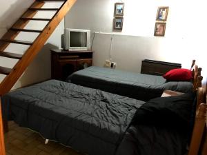 Postel nebo postele na pokoji v ubytování Casa En Necochea 6 personas