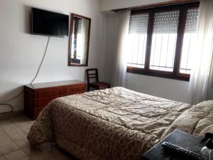 Postel nebo postele na pokoji v ubytování Casa En Necochea 6 personas + 5 fotografií