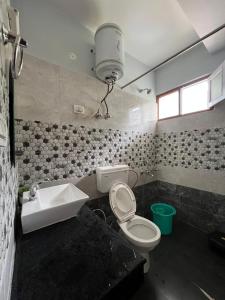 Un baño de Lha Pomo