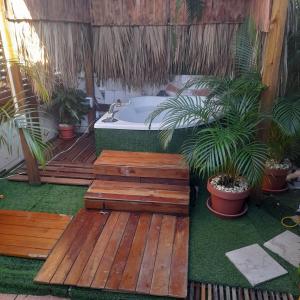 Ένα ή περισσότερα κρεβάτια σε δωμάτιο στο Tropical 2