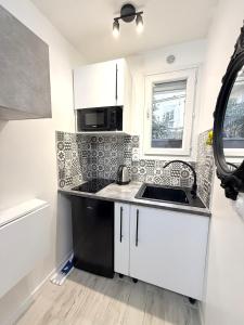 Køkken eller tekøkken på Tour Eiffel Montparnasse 4