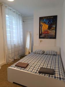 Postel nebo postele na pokoji v ubytování Centrum Lwowska