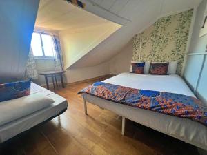 Postel nebo postele na pokoji v ubytování City Centre Sulemange Rooms Mouraria