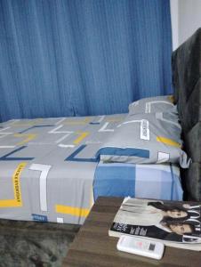 En eller flere senge i et værelse på Roominlapaz