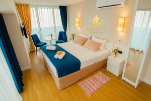 Postel nebo postele na pokoji v ubytování Batumi Bay * Orbi City *