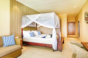 Ένα ή περισσότερα κρεβάτια σε δωμάτιο στο Tamala Beach Resort +20 φωτογραφίες