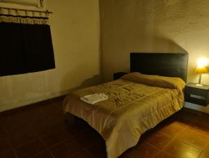 Postel nebo postele na pokoji v ubytování El Molle City