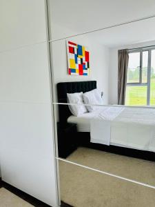 Ένα ή περισσότερα κρεβάτια σε δωμάτιο στο Dukes View -explore Haspengouw & surrounding towns