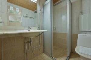 Koupelna v ubytování Hotel Kittilä