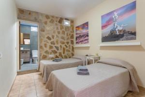 Ένα ή περισσότερα κρεβάτια σε δωμάτιο στο Villa Juan Martin +18 φωτογραφίες