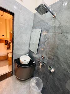 Koupelna v ubytování Hotel RS Grand