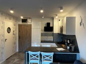 Η κουζίνα ή μικρή κουζίνα στο Urlaub für Paare direkt am Meer