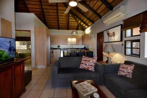 Kuchyň nebo kuchyňský kout v ubytování Ngwenya Lodge