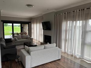 Posezení v ubytování Fairway Escape