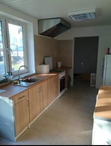 Η κουζίνα ή μικρή κουζίνα στο Nowoczesna Stodoła