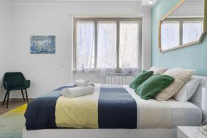 Postel nebo postele na pokoji v ubytování Conca D'Oro Guest House - Elisabetta + 11 fotografií