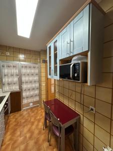 Kuchyň nebo kuchyňský kout v ubytování VUT Parque II TORREON 4 dormitorios y 2 baños Parking gratuito cercano