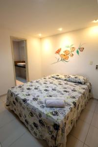 Postel nebo postele na pokoji v ubytování Casa Vista ao Mar - Paisagem Deslumbrante e Localização Perfeita