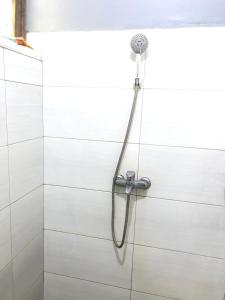 Koupelna v ubytování Rehoboth Homestay + 10 fotografií