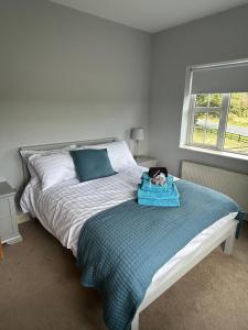 Ένα ή περισσότερα κρεβάτια σε δωμάτιο στο 6 bed house, 4 bath house in Brickens