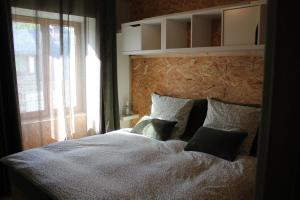 Ένα ή περισσότερα κρεβάτια σε δωμάτιο στο Chouette Bourboule 2 chambres, 6 pers, terrasse