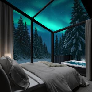 Postel nebo postele na pokoji v ubytování Halo Igloos - Private Sauna & Jacuzzi