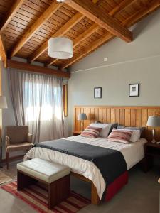 Postel nebo postele na pokoji v ubytování Las Bayas Home Suites