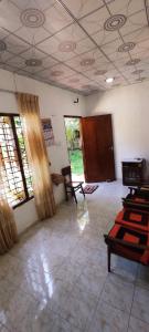 Posezení v ubytování Omandi Villa