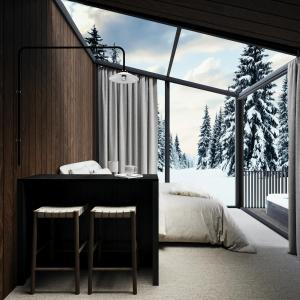 Postel nebo postele na pokoji v ubytování Halo Igloos - Private Sauna & Jacuzzi