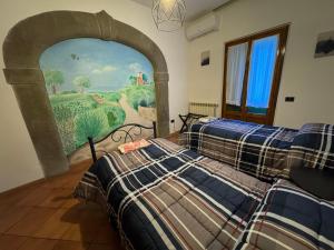 Postel nebo postele na pokoji v ubytování Villino Dragonfly