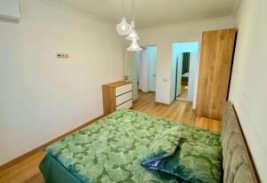 Ένα ή περισσότερα κρεβάτια σε δωμάτιο στο Modern Apartment In Yerevan by Republic squer