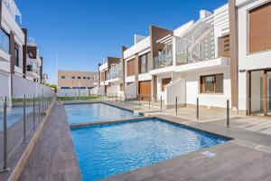 an image of a swimming pool in a building at Casa MardeSal in San Pedro del Pinatar