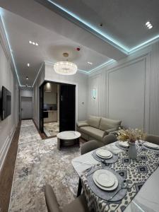 Posezení v ubytování Nest One - 35 Floor Luxury apartment + 11 fotografií