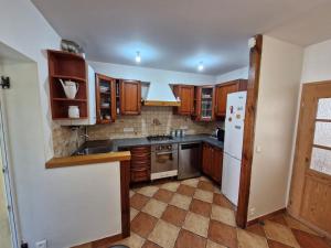 Kuchyň nebo kuchyňský kout v ubytování Appartement de 45 m2