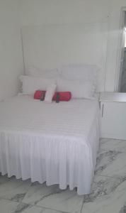 Postel nebo postele na pokoji v ubytování Restwell Lodge