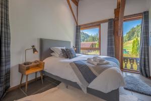 Postel nebo postele na pokoji v ubytování Hot tub, Sauna, Private shuttle and Privacy - 14 ppl - Stunning Ferme Liberté