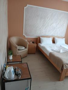 Postel nebo postele na pokoji v ubytování Sobe Sara