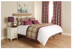 Postel nebo postele na pokoji v ubytování Little Silver Country Hotel