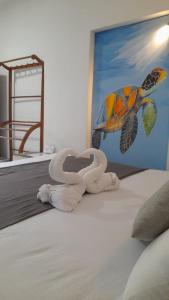 Ένα ή περισσότερα κρεβάτια σε δωμάτιο στο TaMaRiNd house