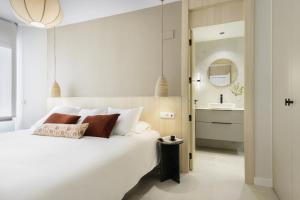 Ένα ή περισσότερα κρεβάτια σε δωμάτιο στο Cima Panticosa by BeValle