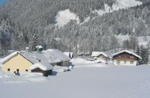 Haus Zink v zimě + 2 fotografie