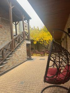 a basket hanging from the side of a building at Boutique Living Hotel in Yerevan